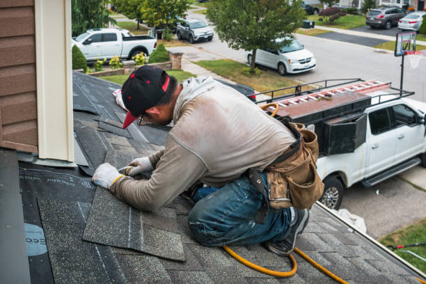 Professional Storm Damage Roof Repair technician working in North Andover, MA